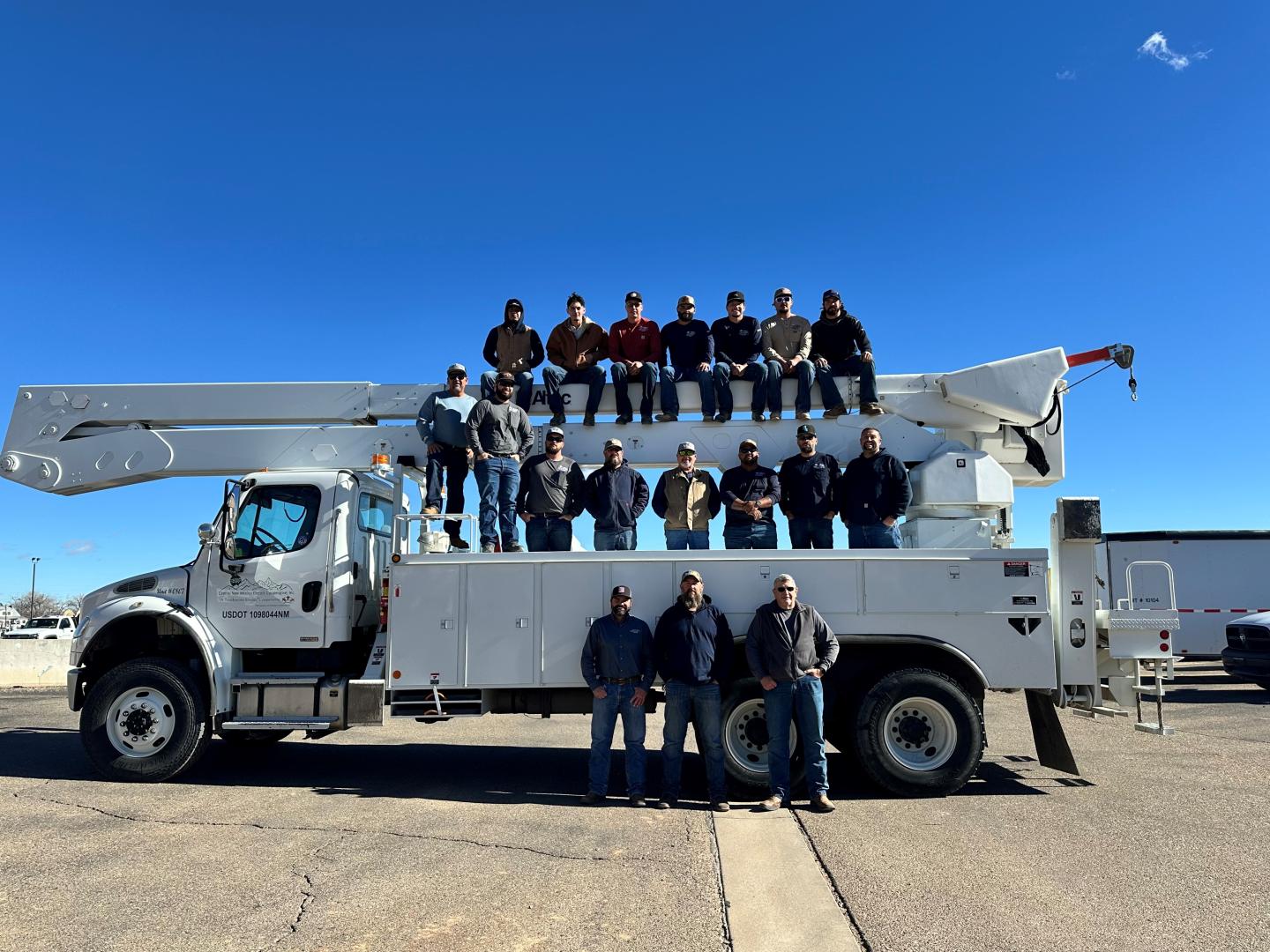 CNMEC Employees on truck